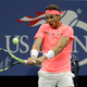 Rafael Nadal, of Spain, returns a shot from Dusan Lajovic, of Serbia, during the first round of the U.S. Open tennis tournament, Tuesday, Aug. 29, 2017, in New York. (AP Photo/Frank Franklin II)
